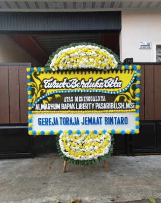 Papan Bunga Duka di Arma Jaya